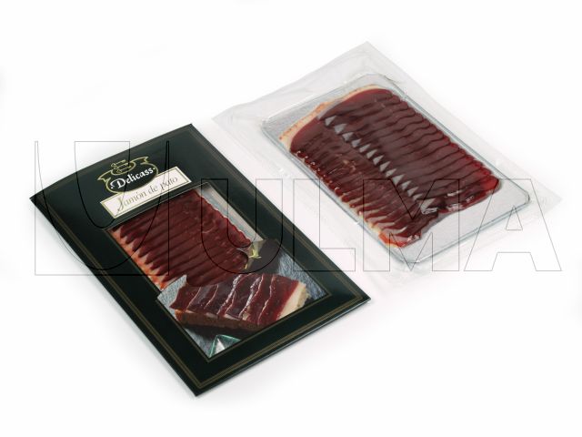 Sliced duck ham vacuum packaging in thermoforming in flexible film